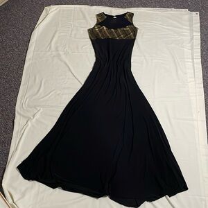 Black and Gold floor length Gown with Peakaboo mesh window on bust